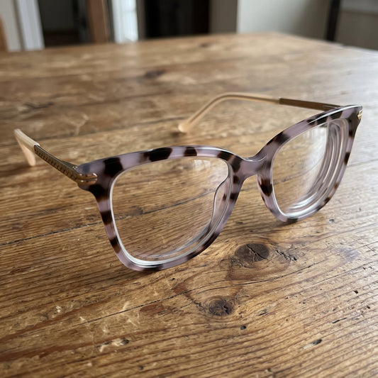 Why Thick Lenses Happen, and How to Get Thinner Ones